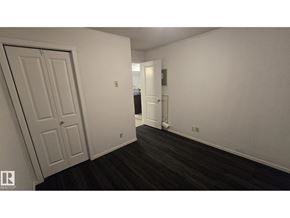 Edmonton apartment for rent - A room with a white door and a white wall.