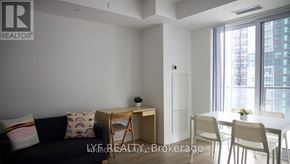 Toronto (Waterfront Communities) condo for rent - A realtor logo is on the top left corner of the image.