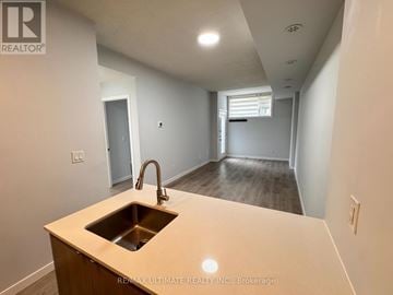 Burlington (Lasalle) townhouse for rent - A kitchen with a sink and a countertop.
