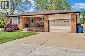 Windsor apartment for rent - A house with a garage door and a driveway.
