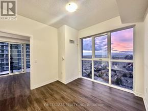 Mississauga (Hurontario) condo for rent - A room with a view of a rocky landscape through the windows.