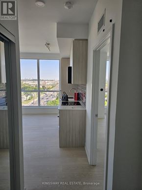 Toronto (Clairlea-Birchmount) condo for rent - A real estate office with a view of the city.