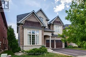 Burlington (Alton) apartment for rent - A house with a brick facade and a large front yard.