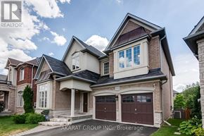 Burlington (Alton) apartment for rent - A large, two-story house with a garage is for sale.
