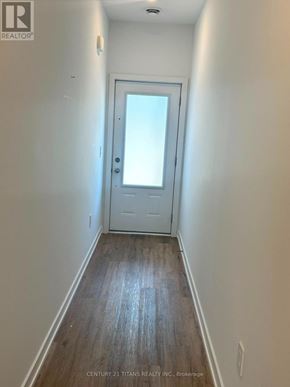 Welland (Lincoln/Crowland) apartment for rent - A hallway with a door at the end.