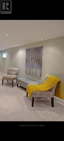 Burlington (Lasalle) apartment for rent - A room with a yellow blanket on a chair.
