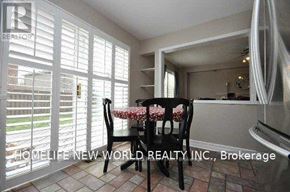 Oshawa (Eastdale) apartment for rent - A dining room with a table set for four.