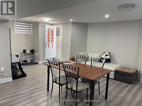 Toronto (Highland Creek) apartment for rent - A dining room with a table and chairs.