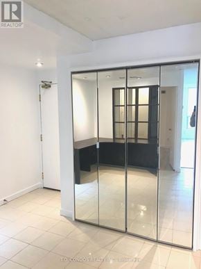 Toronto (Church-Yonge Corridor) condo for rent - A room with a glass door and a white wall.
