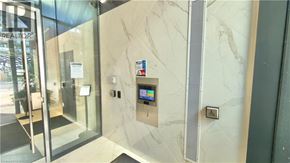 Toronto condo for rent - A glass door with a sign that says "REALTOR" on it.