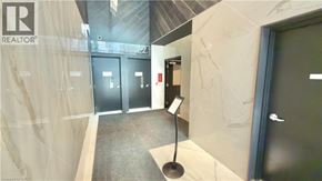 Toronto condo for rent - A hallway with a sign that says REALTOR.