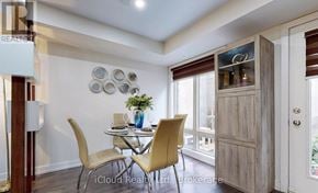 Markham (Cornell) townhouse for rent - A dining room with a table set for two and a view of the backyard.