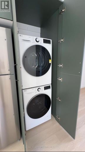Hamilton (Corktown) multi-family for rent - A washing machine is in a cabinet.
