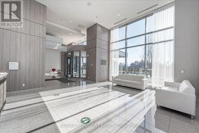 Burlington (Freeman) condo for rent - A modern office lobby with a glass floor and white furniture.