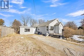 London South (South E) apartment for rent - A house with a gravel driveway in front of it.