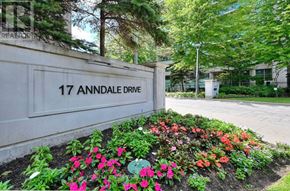 Toronto (Willowdale East) condo for rent - A flower bed in front of a building with the number 17 on it.