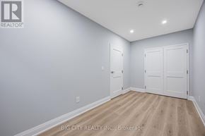 Toronto (Tam O'shanter-Sullivan) apartment for rent - A room with a white door and a white wall.