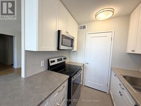 London East (East B) condo for rent - A kitchen with a microwave above the stove.