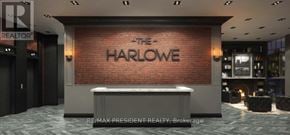 Toronto (Waterfront Communities) condo for rent - The Harlowe is a modern and stylish real estate office.