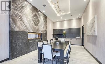 Milton (Co Coates) condo for rent - A dining room with a table set for four.