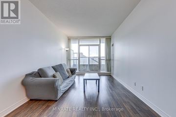 Mississauga (City Centre) condo for rent - A living room with a grey couch and a coffee table.