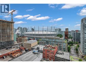 Vancouver apartment for rent - A construction site with a crane and a building under construction.