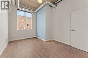 Windsor apartment for rent - A room with a window and a door is available for rent.