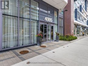 Mississauga (City Centre) condo for rent - The image shows the front of a RE/MAX Realty Specialists Inc. office building with the number 4065 on it.