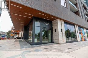 Burlington (Brant) condo for rent - A modern building with the number 2075 on the entrance.