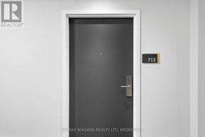 Niagara Falls (Hospital) condo for rent - A door with a number 712 on it.