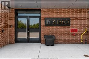Windsor apartment for rent - The front of a building with a sign that says 3180.