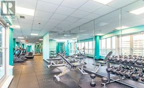Toronto (Clairlea-Birchmount) condo for rent - A gym with a variety of equipment including treadmills, weights, and exercise machines.