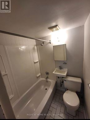 Toronto (South Riverdale) apartment for rent - A white bathroom with a toilet, sink, and bathtub.