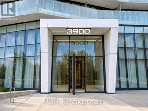 Mississauga (City Centre) condo for rent - The entrance to a building with the number 3900 on it.