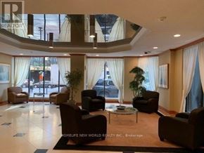 Toronto (Bay Street Corridor) condo for rent - A living room with a large window and a view of the street outside.