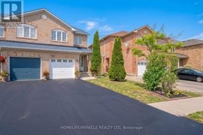 Brampton (Fletcher's Meadow) apartment for rent - A residential area with houses and a car parked on the street.