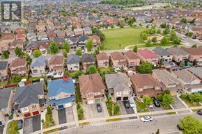 Brampton (Fletcher's Meadow) apartment for rent - A bird's eye view of a residential area with houses and streets.