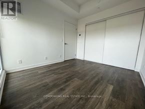 Toronto (Willowdale East) condo for rent - A room with wood flooring and white walls.