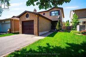 Mississauga (Meadowvale) apartment for rent - A brick house with the number 7110 on it.