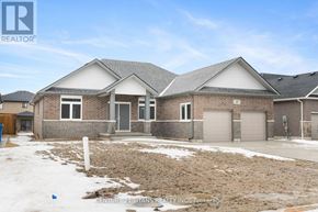 Chatham-Kent apartment for rent - A house with a grey roof and a sign that says Century 21 Titans Realty Inc. Brokerage.