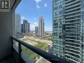 Mississauga (Creditview) condo for rent - A view from a balcony overlooking a cityscape with tall buildings.