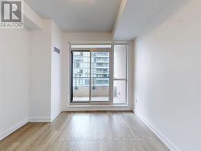 Mississauga (Creditview) condo for rent - A room with a large window and a wooden floor.