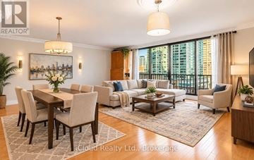 Toronto (Waterfront Communities) condo for rent - A well-lit living room with a dining table and chairs.