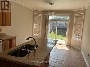 Brampton (Bramalea North Industrial) apartment for rent - A kitchen with a sink and a window.