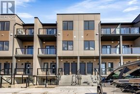 Guelph (Clairfields/Hanlon Business Park) townhouse for rent - A building with the word REALTOR on the top left corner.