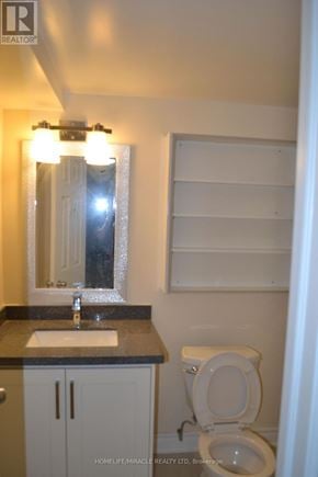 Markham (Middlefield) apartment for rent - A bathroom with a toilet, sink, and medicine cabinet.