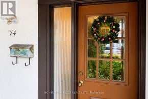 Mississauga (Meadowvale) townhouse for rent - A brown door with a wreath on it.