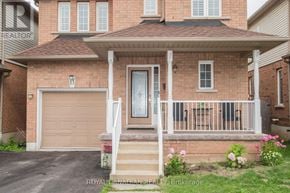 Hamilton (Stoney Creek) apartment for rent - A brick house with a white door and windows.