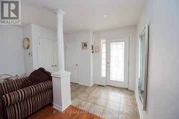 Hamilton (Stoney Creek) apartment for rent - A living room with a couch and a fireplace.