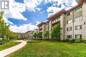 Mississauga (Mississauga Valleys) condo for rent - A sunny day at a residential apartment complex with a clear blue sky.
